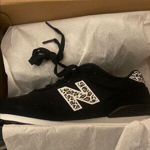 Black sneakers with leopard print N